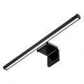 Black computer screenbar lamp with asymmetric optical design and LED light source.